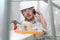 Man work, professional construction worker  with mobile cell phone, plastering tools on scaffolding, safety hard hat, gloves and