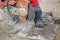 Man worker cutting concrete circular tool diamond blade