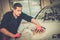 Man worker washing luxury car