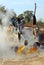 Man working in a factory boiling sugar cane.