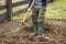 Man working in garden with fork