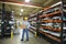 Man Working in Industrial Manufacturing Warehouse