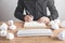 Man working in office. Crumpled paper balls on the table