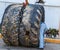 Man works on 2 giant tires in harbor of Acapulco, Mexico