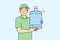 Man works as water delivery man holding large water cooler bottle in hands
