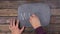 Man writes the word MINTING with chalk on a chalkboard, stylized as a thought.