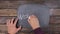 Man writes the word WORKSHOP with chalk on a chalkboard, stylized as a thought.