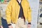Man with yellow bomber jacket before Dirk Bikkembergs fashion show, Milan Fashion Week street style on January