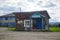 Mana village, Krasnoyarsk region, Russia - August 23, 2020: Old wooden shop in the village