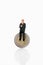 Manager figurine sitting on euro coin