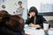 Manager mad at businesswomen sleeping in meeting