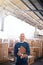 Manager, smile and portrait of man in warehouse for cargo, storage and shipping. Distribution, ecommerce and logistics