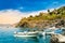 Manarola, Cinque Terre - fishing boats in a sea near romantic village on cliff in Cinque Terre National Park