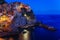 Manarola, Liguria, Italy. The wonderful Manarola village. Quiet sky and peaceful sea, during sunset.