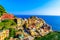 Manarola village in beautiful scenery of mountains and sea - Spectacular hiking trails in vineyard with flowers in Cinque Terre