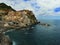 Manarola village on cliff rocks and sea