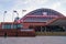 Manchester Central Convention Complex in the UK as a man holding a mobile phone walks by. Former Manchester Central railway