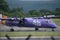 MANCHESTER UK, 30 MAY 2019: Flybe Bombardier Dash 8 flight BE664 from Knock lands on runway 23R at Manchaester Airport