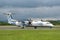 MANCHESTER UK, 30 MAY 2019: Flybe Bombardier Dash 8 Q400 flight BE454 from Jersey lands on runway 23R at Manchaester Airport