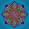 MANDALA ART NOUVEAU. PLAIN BLUE BACKGROUND. CENTRAL FLOWER IN BLUE, PURPLE, RED, ORANGE, TUQUOISE