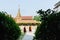 Mandalay, Myanmar - April 2019: Buddhist monks walking in the backyard of Royal Palace