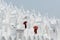 Mandalay, Myanmar - April 2019: Buddhist novice monks with red umbrellas walking on the walls of Myatheindan Pagoda