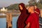 Mandalay, Myanmar - Nov 12, 2019: Monks at U Bein bridge in Amarapura