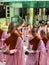 Mandalay, Myanmar - November 7, 2019: Young Buddhist nuns in monastery queueing for lunch