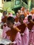 Mandalay, Myanmar - November 7, 2019: Young Buddhist nuns in monastery queueing for lunch