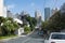 Mandaluyong, Metro Manila, Philippines - The Ortigas Skyline as seen from a street inside Wack Wack Village, an