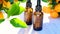 Mandarin oil.Citrus essential oil.Organic natural bio oil. Mandarin essential oil in brown glass bottles and mandarin