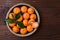 Mandarin Oranges in Bowl on Wood