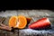 Mandarin, strawberry on an old wooden table in an