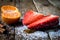 Mandarin, strawberry on an old wooden table in an