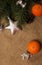 Mandarines, Fir-cones, Christmas decorations and fur-tree branch