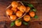 Mandarins tangerines on wooden table top view