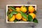 Mandarins in wooden box