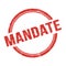 MANDATE text written on red grungy round stamp