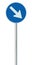 Mandatory keep right European Union EU road sign on pole post, large blue round isolated traffic lane route reroute roadside