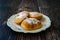 Mandazi is a slightly sweet East African Street Food; spicy, airy yeast doughnut dough made with coconut milk, flavored with