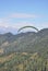 Mandi, Himachal Pradesh, India - 10 16 2021: A young guy enjoying paragliding with professional pilot in the sky