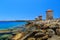 Mandraki Harbour windmills on the Island of Rhodes Greece. Sunny day