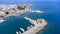 Mandraki port of Rhodes city harbor and Elli beach a popular summer tourist destination, aerial panoramic view in Rhodes island in