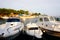 Mandre, Island of Pag, Croatia, July 27, 2019. Small port with mooring boats on the seacoast in sunset