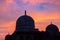 Mandu India, afghan ruins of islam kingdom, mosque monument and muslim tomb. Colorful sky at sunrise.