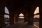 Mandu India, afghan ruins of islam kingdom, mosque monument and muslim tomb. View through door, Jahaz Mahal.