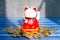 Maneki is a kind of plastic cat with a beckoning paw, symbolizing good luck and wealth