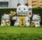 Maneki-Neko japan lucky cat in front of Gateway Ekamai department store, Bangkok