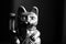 Maneki Neko, the Lucky Cat, covered with dust, black and white. Concept of fast passing time and expectation of good luck