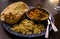 Mangalorean style roasted cauliflower and spinach curry with basmati rice and garlic naan bread, tasty vegetarian food